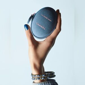 CHANEL Blue Oval La Crème Main Case with Pink Logo